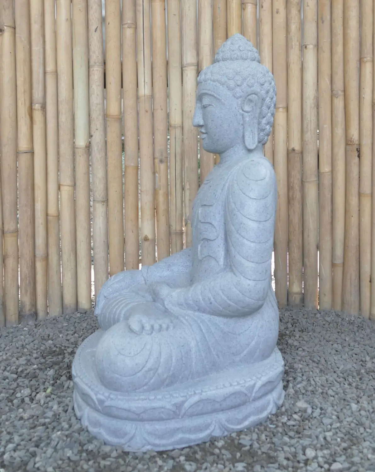  Product image 5 of the product “Seated Buddha made of Riverstone in Bhumisparsha - gesture of touching the earth. 82cm height. ”